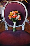 wedding bouquet on an antique armchair
