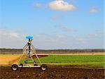 Australian Agriculture Ploughed sugarcane field with irrigation equipment rural landscape scene