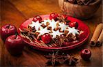 Homemade gingerbread star cookies for Christmas on the plate