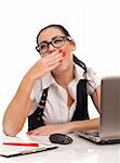 Portrait of bored business woman sitting on her desk