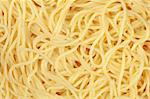 Cooked spaghetti forming a background with copyspace