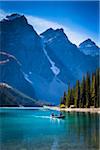 Canoeists on Moraine Lake, Banff National Park, Alberta, Canada