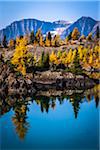 Rock Isle Lake in Autumn with Mountain Range in Background, Mount Assiniboine Provincial Park, British Columbia, Canada