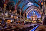 Tourists inside Notre-Dame Basilica, Montreal, Quebec, Canada