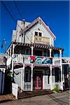 House Exterior with Shark Tour Banner on Balcony, Wesleyan Grove, Camp Meeting Association Historical Area, Oak Bluffs, Martha's Vineyard, Massachusetts, USA