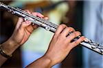 Close-Up of Woman Playing Flute at Taberna de La Muralla in Plaza Vieja, Havana, Cuba