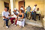 Members of Club Amigos Social Dance Club Relaxing on Porch, Trinidad, Cuba