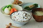 Japanese style dishes and chopsticks on a table