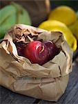 Plums in a paper bag, Sweden.