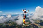 Parachute jumpers in the sky, Sweden.