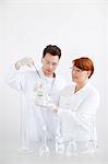 Two scientists working in laboratory