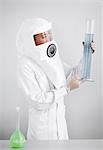 Male scientist in laboratory wearing protective suit