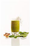 Green smoothie on white background, studio shot