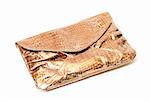 Shiny gold evening bag with a textured surface and classical clutch design on a white background