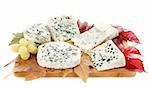 different kinds of blue cheeses in front of white background