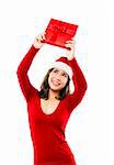 Beautiful asian woman wearing Santa's hat and holding a christmas gift, isolated on white