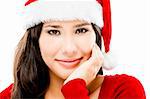 Beautiful close-up portrait of a asian woman with a beautiful smile wearing Santa's hat