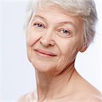 Elderly woman on a white background