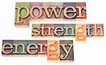 power, strength, energy words - isolated text in vintage letterpress wood type blocks stained by color inks