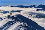 climber on the mountain in winter, Piatra Craiului Mountains, Romania