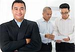 Southeast Asian business men in office