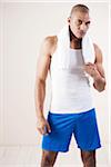 Man Wearing Work Out Clothes in Studio with White Background