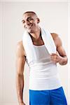 Man Wearing Work Out Clothes in Studio with White Background