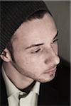 Close-up, High Angle View of Young Man wearing Woolen Hat, Studio Shot