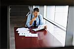 Businessman reading at desk