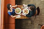 Couple having lunch at cafe