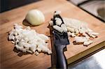 Chopped onions on cutting board