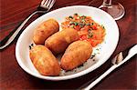 Potato croquettes with tomato sauce