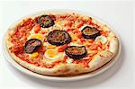 A grilled aubergine and egg pizza