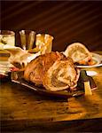 Turducken on a Platter on Wooden Table