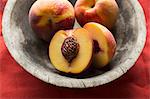 Fresh Peaches in a Bowl; Whole and Halved