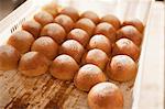 Freshly baked bread rolls topped with sugar