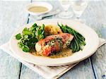 Stuffed chicken breast with herb sauce and green beans