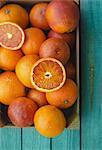 Blood oranges in a wooden crate