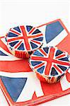 Two Union Jack cupcakes on matching paper napkins