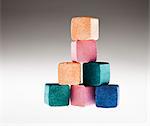 Close up of stacked cubes of multicolor eyeshadow