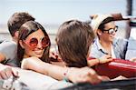 Friends driving in convertible