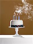 Extinguished birthday candles on birthday cake