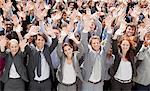 Portrait of cheering business people in crowd