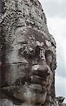 A smiling face carved in stone, Bayon, Angkor, UNESCO World Heritage Site, Siem Reap, Cambodia, Indochina, Southeast Asia, Asia