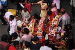 Community carrying Ganesha together for immersion, Mumbai, Maharashtra, India, Asia