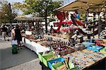 Stalls in the street market held every Sunday in Ile sur la Sorgue, Provence, France, Europe