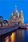 The Church on Spilled Blood, UNESCO World Heritage Site, on the Kanal Griboedova, illuminated at dusk, St. Petersburg, Russia, Europe