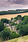 Overlooking the Cotswolds village of Snowshill, with Broadway Tower on the horizon, Worcestershire, England, United Kingdom, Europe