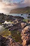 Rockpools on the foreshore on the west coast of Sandoy, Faroe Islands, Denmark, Europe