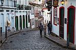 People walking along street, Ouro Preto, UNESCO World Heritage Site, Minas Gerais, Brazil, South America